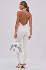 MIXED MESSAGES PLUNGING JUMPSUIT