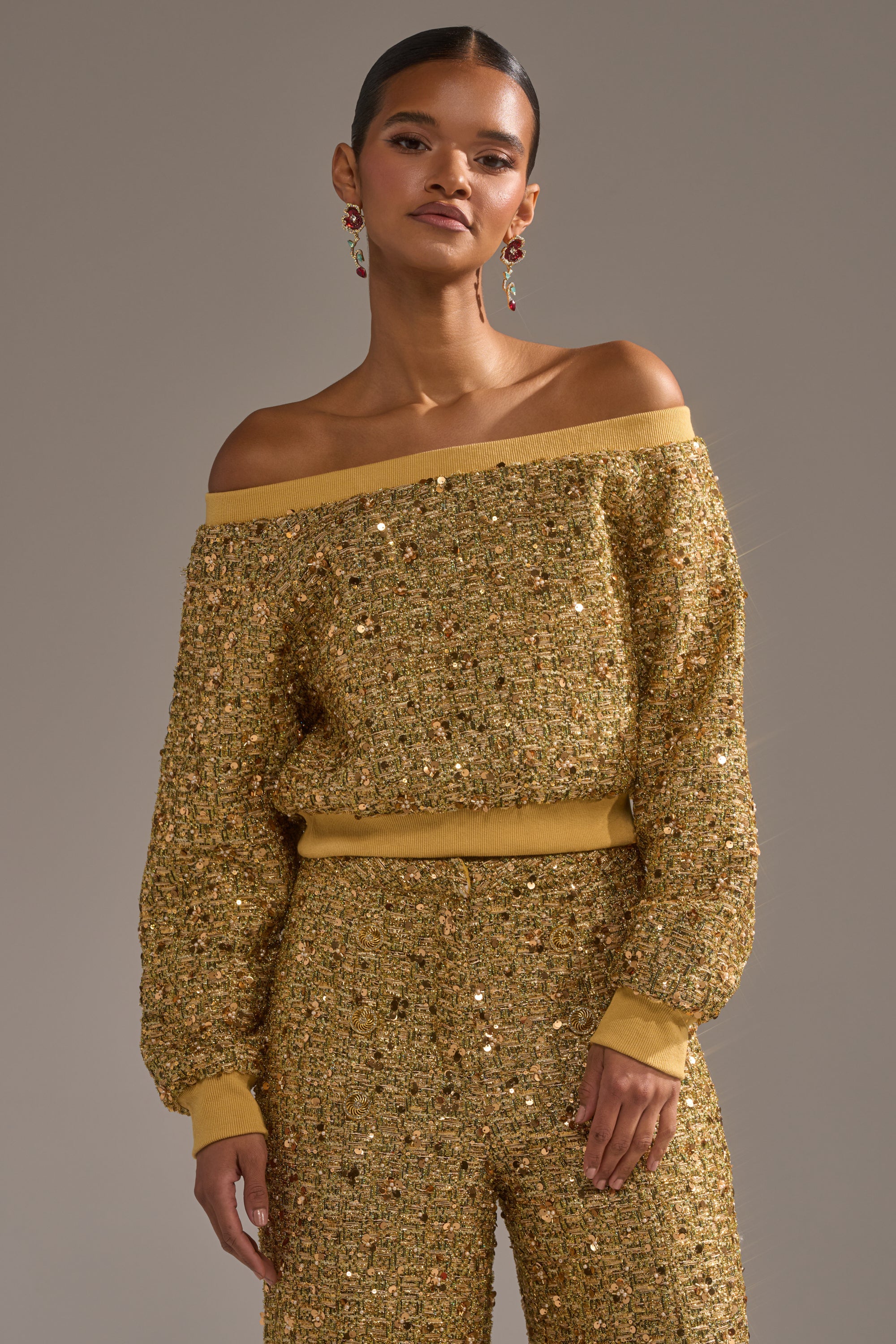PRETTY IN GOLD OFF THE SHOULDER SWEATSHIRT