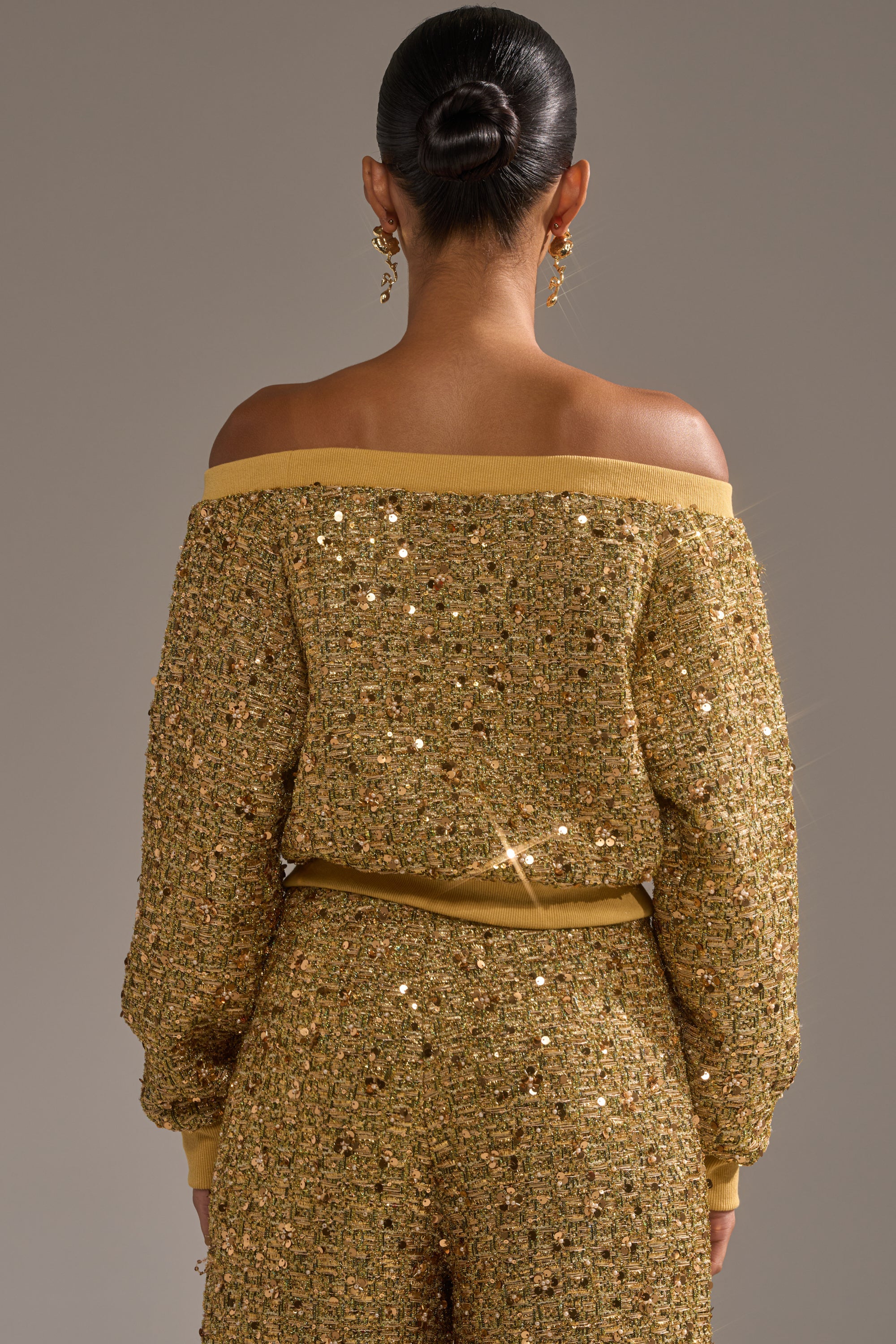 PRETTY IN GOLD OFF THE SHOULDER SWEATSHIRT