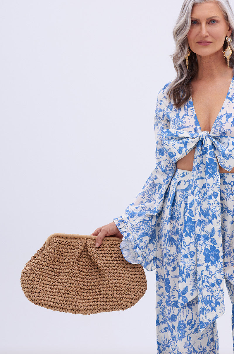 OUT OF OFFICE OVERSIZED RAFFIA CLUTCH