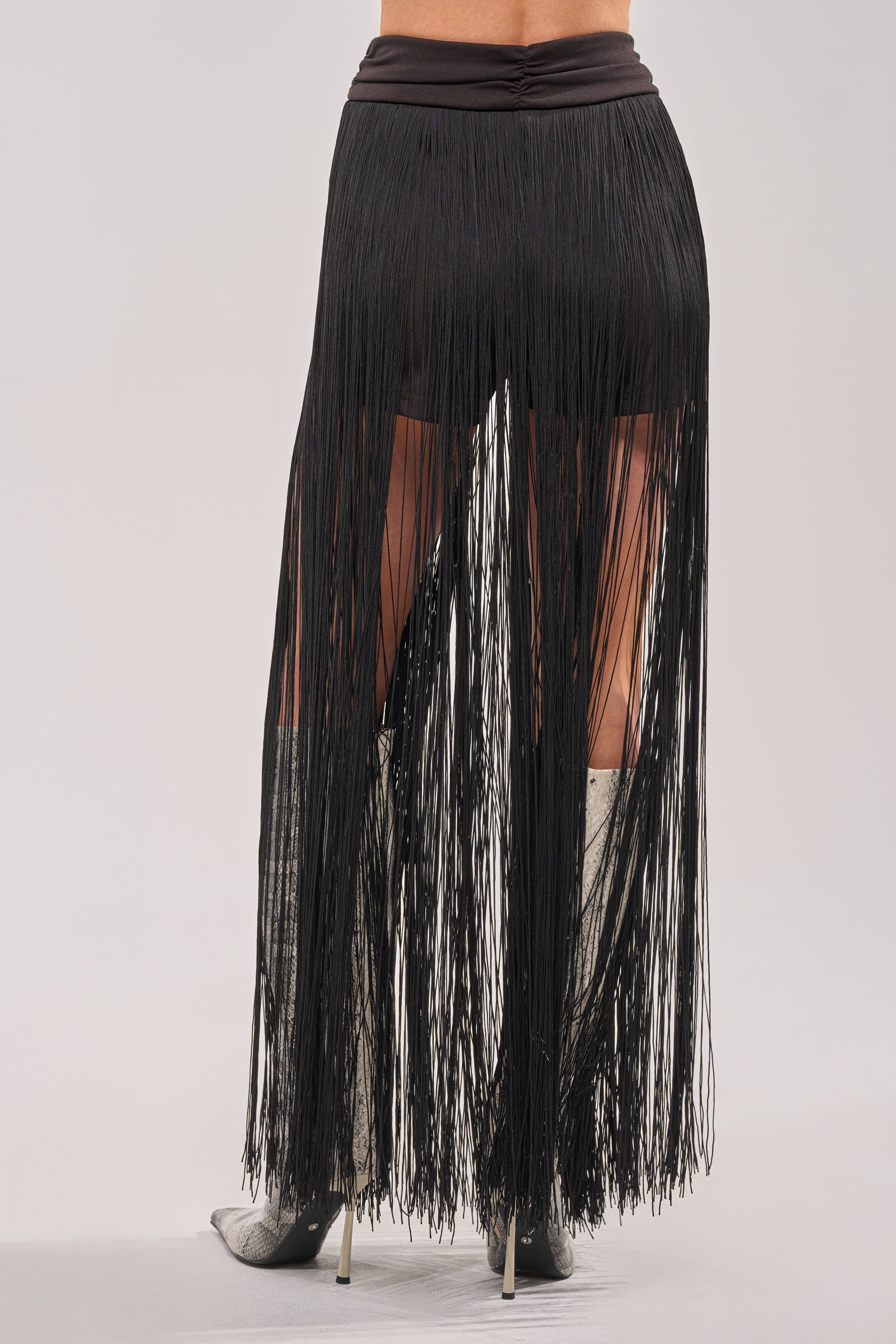 ON THE EDGE FRINGE SKIRT IN BLACK